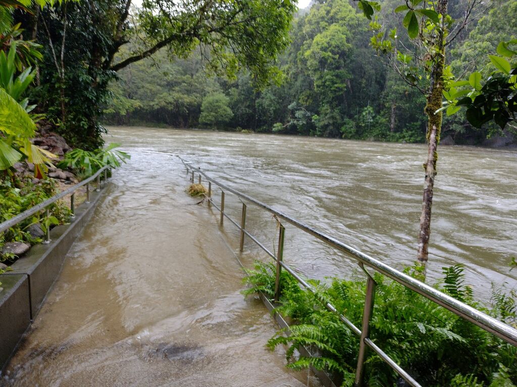 Babinda Boulders this April during heavy rainfall, flooding coming up the walkway